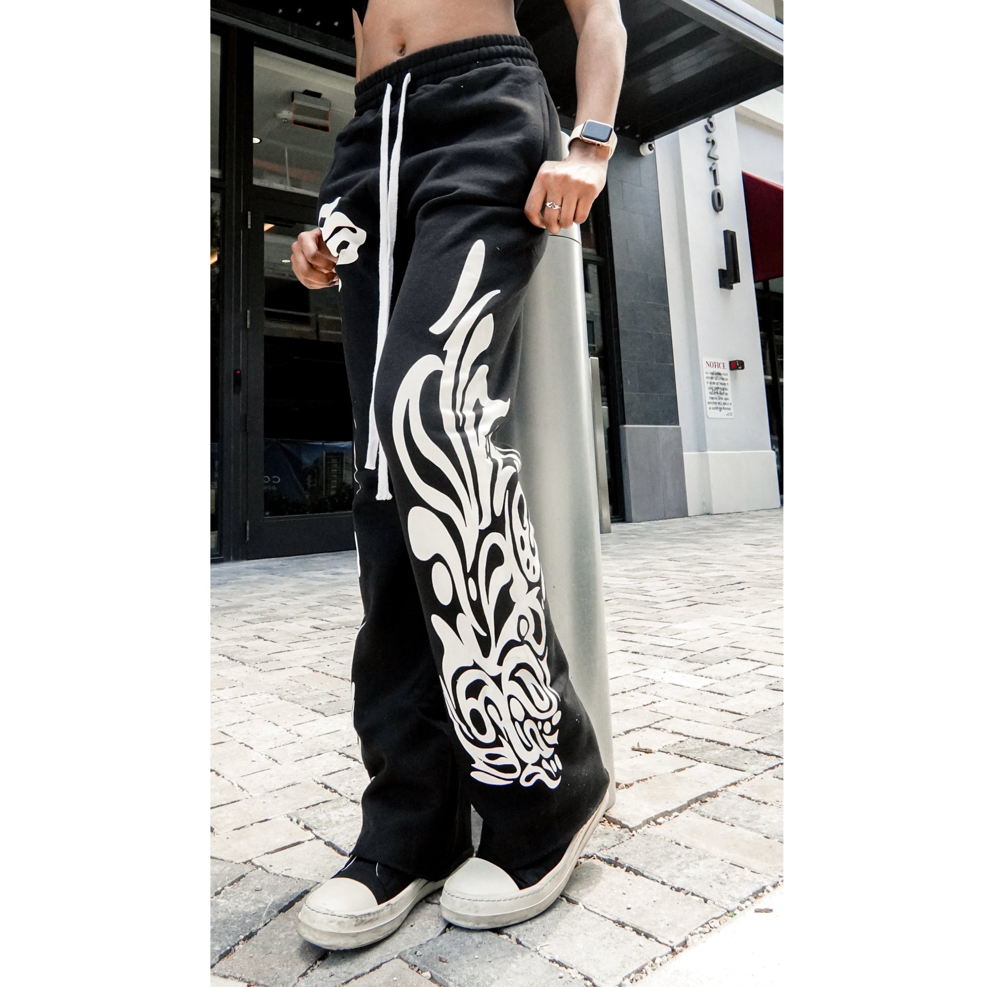 Black unisex “S” flared sweatpants