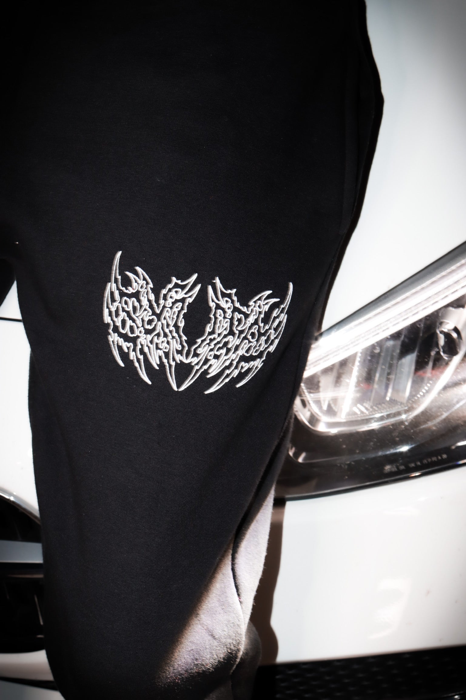 Black sixteen flared unisex sweatpants